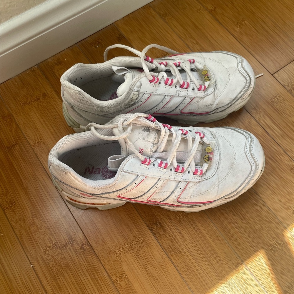 Steel toe tennis shoes. Women's size 9.5. Worn only occasionally.